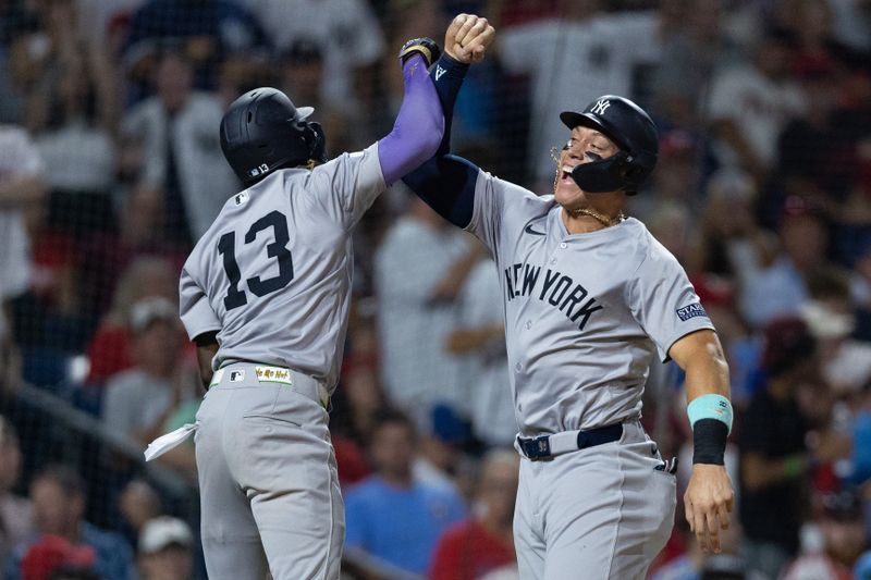 Jul 30, 2024; Philadelphia, Pennsylvania, USA; New York Yankees third base Jazz Chisholm Jr. (13) celebrates with outfielder Aaron Judge (99) after hitting a three RBI home run during the seventh inning against the Philadelphia Phillies at Citizens Bank Park. Mandatory Credit: Bill Streicher-USA TODAY Sports