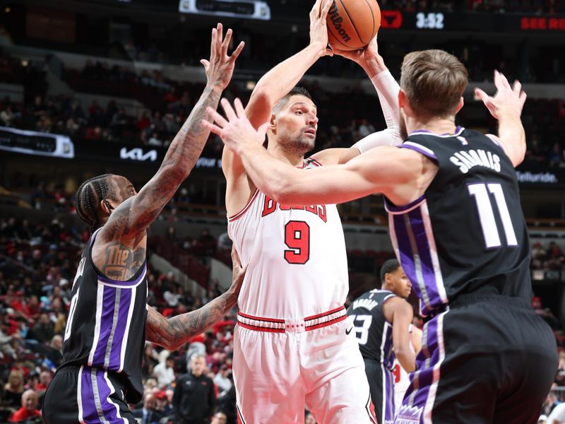 CHICAGO, IL - JANUARY 12: Nikola Vucevic #9 of the Chicago Bulls passes the ball during the game against the Sacramento Kings on January 12, 2025 at United Center in Chicago, Illinois. NOTE TO USER: User expressly acknowledges and agrees that, by downloading and or using this photograph, User is consenting to the terms and conditions of the Getty Images License Agreement. Mandatory Copyright Notice: Copyright 2025 NBAE (Photo by Jeff Haynes/NBAE via Getty Images)