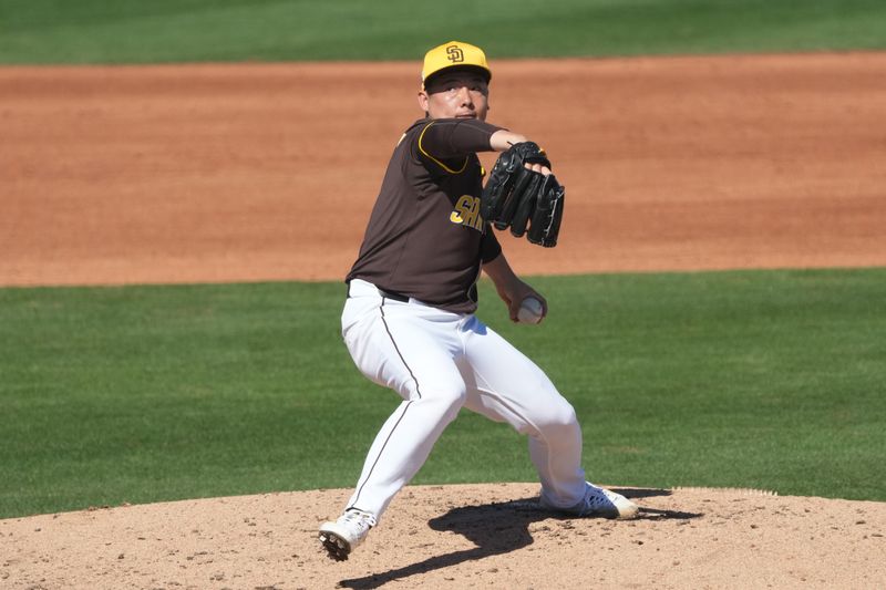 Feb 25, 2025; Peoria, Arizona, USA; San Diego Padres pitcher Yuki Matsui (1) throws against the Los Angeles Angels during the fifth inning at Peoria Sports Complex. Mandatory Credit: Rick Scuteri-Imagn Images