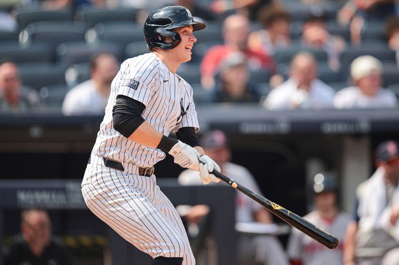 Jul 6, 2024; Bronx, New York, USA; New York Yankees first baseman Ben Rice (93) looks up at his third home run of the game, a three run home run during the seventh inning against the Boston Red Sox at Yankee Stadium. Mandatory Credit: Vincent Carchietta-USA TODAY Sports