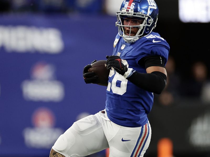 New York Giants running back Saquon Barkley (26) runs with the ball against the Houston Texans during an NFL football game Sunday, Nov. 13, 2022, in East Rutherford, N.J. (AP Photo/Adam Hunger)