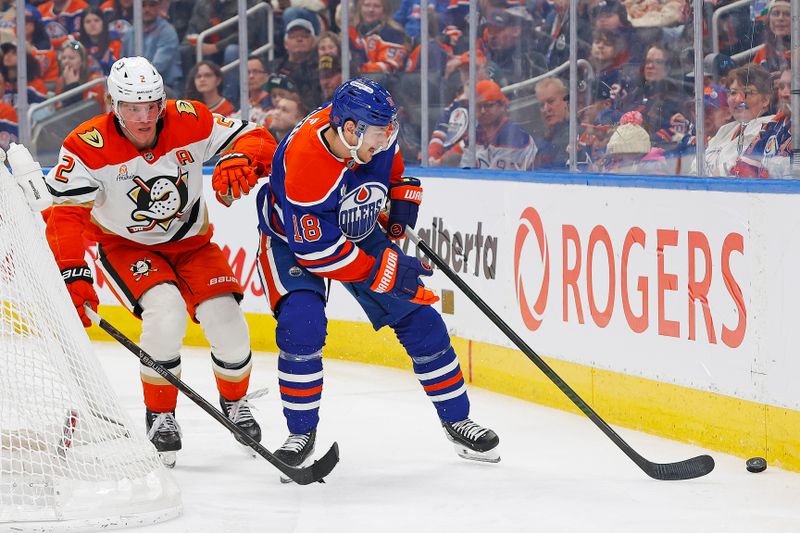Mar 28, 2026; Edmonton, Alberta, CAN; Edmonton Oilers forward Zach Hyman (18) protects the puck from Anaheim Ducks defensemen Jackson LaCombe (2) during the third period at Rogers Place. Mandatory Credit: Perry Nelson-Imagn Images Mar 28, 2026; Edmonton, Alberta, CAN; Edmonton Oilers forward Zach Hyman (18) protects the puck from Anaheim Ducks defensemen Jackson LaCombe (2) during the third period at Rogers Place. Mandatory Credit: Perry Nelson-Imagn Images