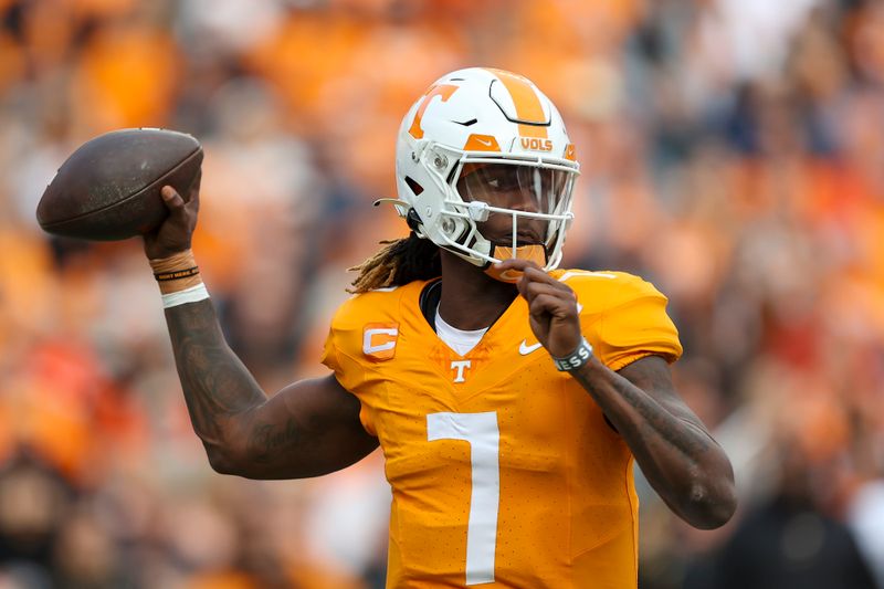 Nov 25, 2023; Knoxville, Tennessee, USA; Tennessee Volunteers quarterback Joe Milton III (7) passes the ball against the Vanderbilt Commodores during the first half at Neyland Stadium. Mandatory Credit: Randy Sartin-USA TODAY Sports