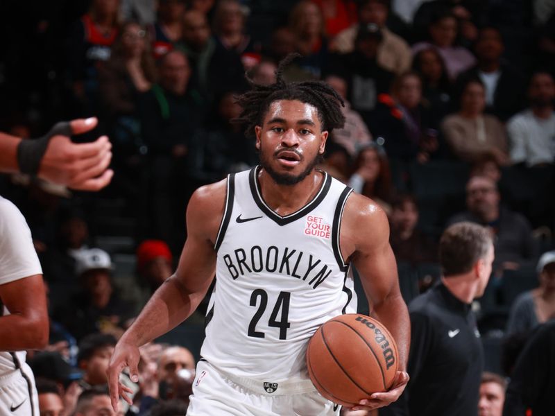 BROOKLYN, NY - OCTOBER 14: Cam Thomas #24 of the Brooklyn Nets dribbles the ball during the game against the Washington Wizards during a NBA preseason game on October 14, 2024 at Barclays Center in Brooklyn, New York. NOTE TO USER: User expressly acknowledges and agrees that, by downloading and or using this Photograph, user is consenting to the terms and conditions of the Getty Images License Agreement. Mandatory Copyright Notice: Copyright 2024 NBAE (Photo by Nathaniel S. Butler/NBAE via Getty Images)