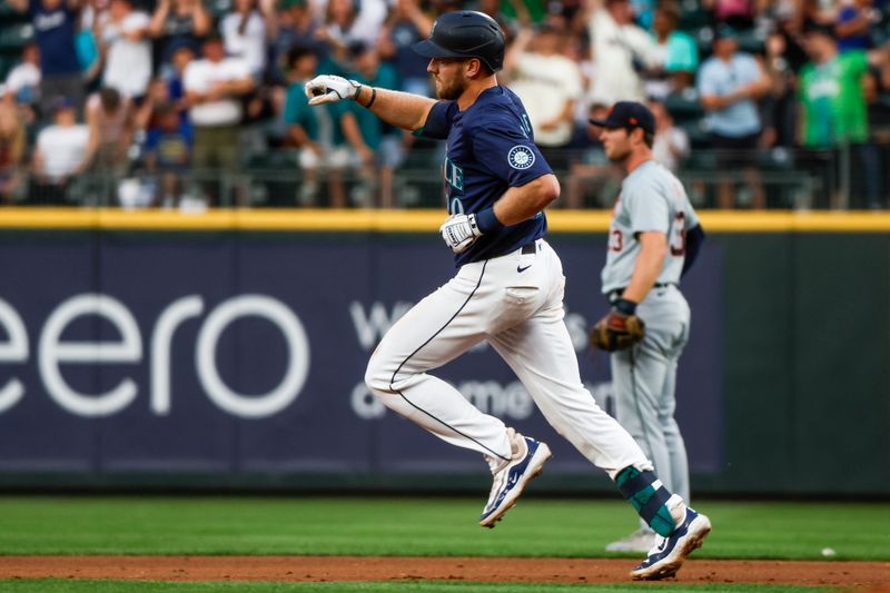 Aug 8, 2024; Seattle, Washington, USA; Seattle Mariners first baseman Luke Raley (20) runs the bases after hitting a solo-home run against the Detroit Tigers during the sixth inning at T-Mobile Park. Mandatory Credit: Joe Nicholson-USA TODAY Sports