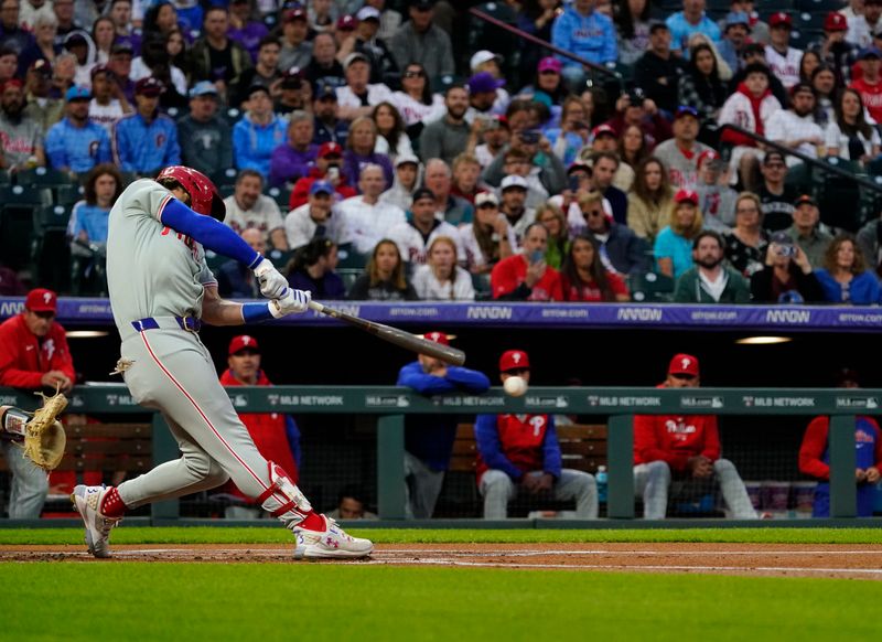 May 25, 2024; Denver, Colorado, USA;  Philadelphia Phillies first base Bryce Harper (3) hit s first-inning single at Coors Field. Mandatory Credit: Michael Madrid-USA TODAY Sports