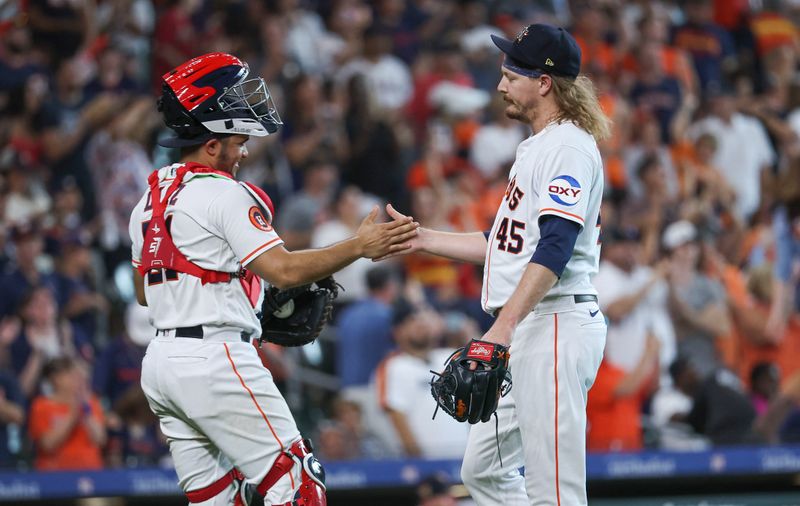 Jul 4, 2023; Houston, Texas, USA; Houston Astros catcher Yainer Diaz (21) celebrates with relief pitcher Ryne Stanek (45) after the final out during the ninth inning against the Colorado Rockies at Minute Maid Park. Mandatory Credit: Troy Taormina-USA TODAY Sports