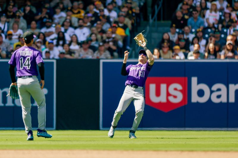 Apr 13, 2025; San Diego, California, USA; Colorado Rockies left fielder Zac Veen (13) makes the catch for an out during the fifth inning against the San Diego Padres at Petco Park. Mandatory Credit: David Frerker-Imagn Images