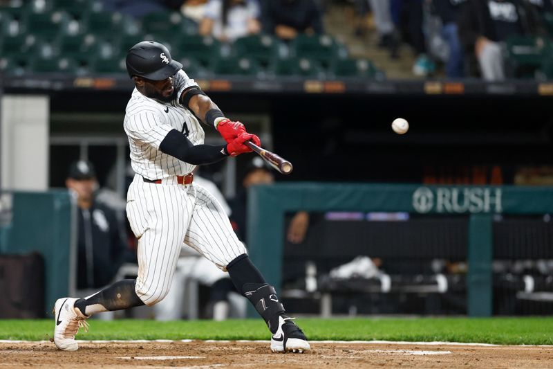 May 9, 2024; Chicago, Illinois, USA; Chicago White Sox third baseman Bryan Ramos (44) singles against the Cleveland Guardians during the third inning at Guaranteed Rate Field. Mandatory Credit: Kamil Krzaczynski-USA TODAY Sports