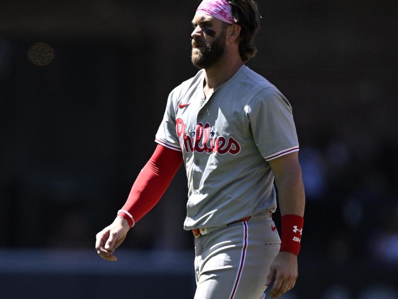 Apr 28, 2024; San Diego, California, USA; Philadelphia Phillies first baseman Bryce Harper (3) looks on during the middle of the seventh inning against the San Diego Padres at Petco Park. Mandatory Credit: Orlando Ramirez-USA TODAY Sports