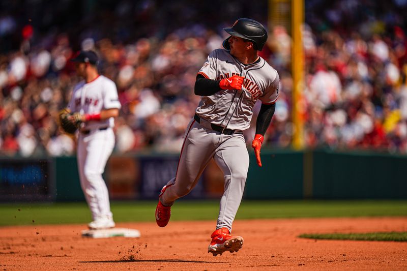 May 2, 2024; Boston, Massachusetts, USA; San Francisco Giants catcher Patrick Bailey (14) to third base against the Boston Red Sox in the seventh inning at Fenway Park. Mandatory Credit: David Butler II-USA TODAY Sports