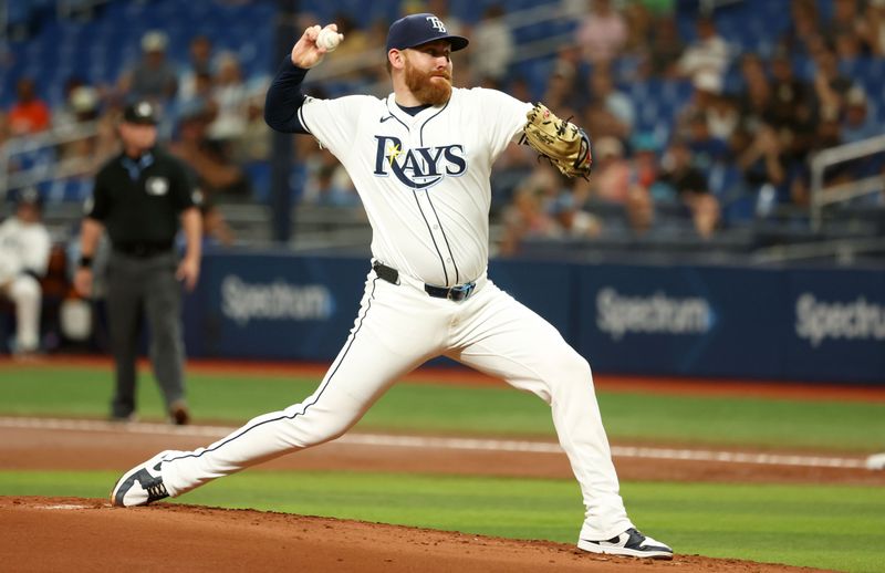 Aug 14, 2024; St. Petersburg, Florida, USA;  Tampa Bay Rays starting pitcher Zack Littell (52) throws a pitch against the Houston Astros during the second inning at Tropicana Field. Mandatory Credit: Kim Klement Neitzel-USA TODAY Sports