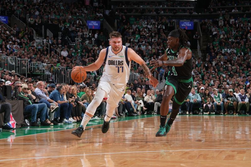 BOSTON, MA - JUNE 9: Luka Doncic #77 of the Dallas Mavericks dribbles the ball during the game against the Boston Celtics during Game 2 of the 2024 NBA Finals on June 9, 2024 at the TD Garden in Boston, Massachusetts. NOTE TO USER: User expressly acknowledges and agrees that, by downloading and or using this photograph, User is consenting to the terms and conditions of the Getty Images License Agreement. Mandatory Copyright Notice: Copyright 2024 NBAE  (Photo by Jesse D. Garrabrant/NBAE via Getty Images)