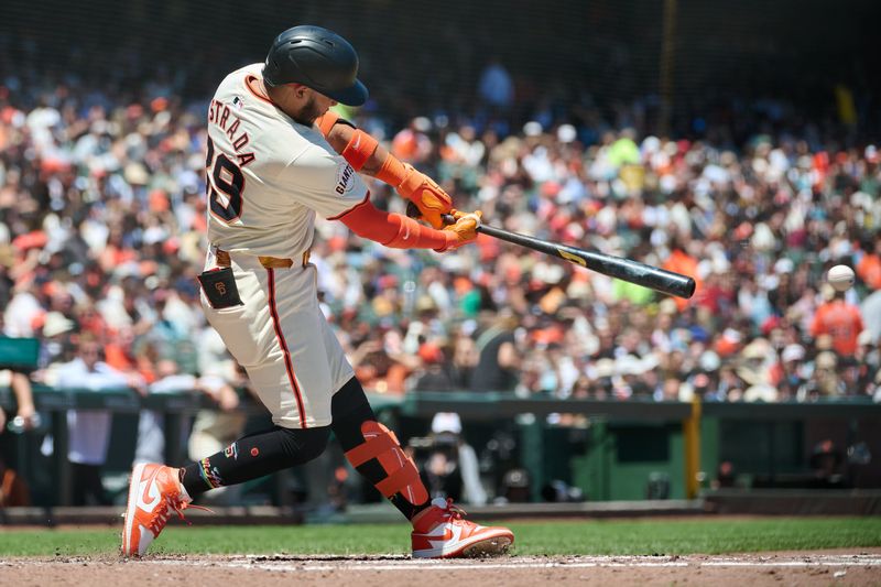 Jun 15, 2024; San Francisco, California, USA; San Francisco Giants infielder Thairo Estrada (39) hits a single against the Los Angeles Angels during the fourth inning at Oracle Park. Mandatory Credit: Robert Edwards-USA TODAY Sports