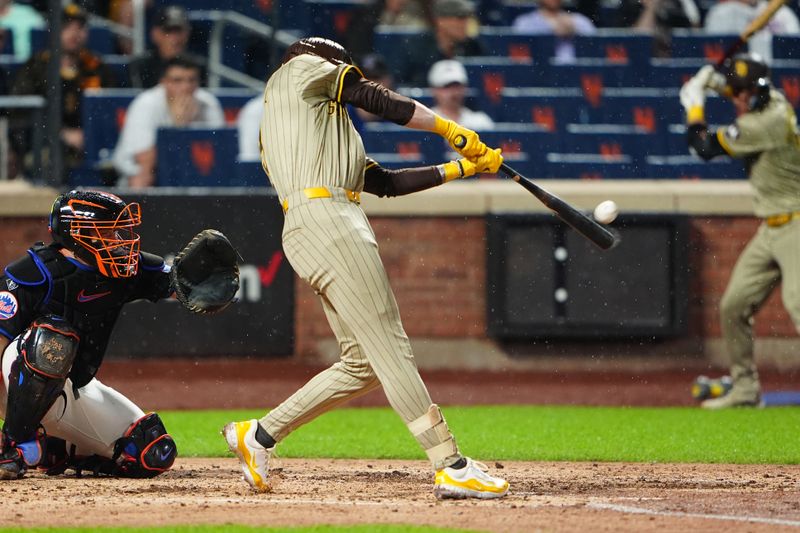 Jun 14, 2024; New York City, New York, USA; San Diego Padres second baseman Jake Cronenworth (9) hits a home rub against the New York Mets during the fifth inning at Citi Field. Mandatory Credit: Gregory Fisher-USA TODAY Sports