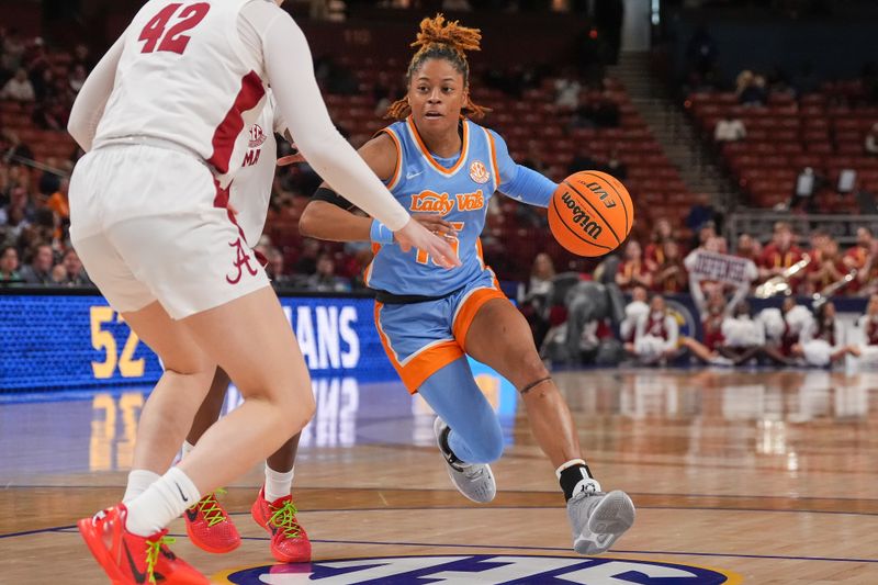 Mar 8, 2024; Greensville, SC, USA; Tennessee Lady Vols guard Jasmine Powell (15) drives to the basket against Alabama Crimson Tide forward Meg Newman (42) during the second half at Bon Secours Wellness Arena. Mandatory Credit: Jim Dedmon-USA TODAY Sports