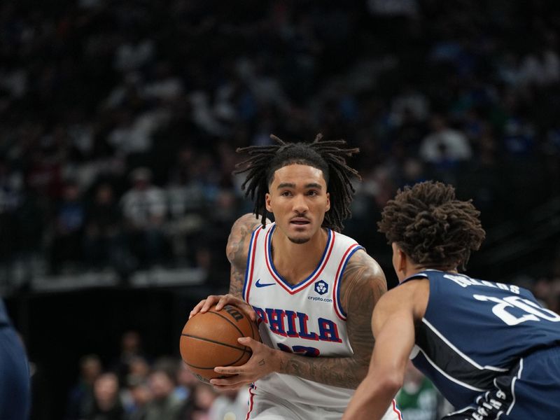 DALLAS, TX - MARCH 16:  Jalen Hood-Schifino #17 of the Philadelphia 76ers handles the ball during the game against the Dallas Mavericks on March 16, 2025 at American Airlines Center in Dallas, Texas. NOTE TO USER: User expressly acknowledges and agrees that, by downloading and or using this photograph, User is consenting to the terms and conditions of the Getty Images License Agreement. Mandatory Copyright Notice: Copyright 2025 NBAE (Photo by Glenn James/NBAE via Getty Images)