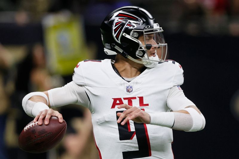 Atlanta Falcons quarterback Desmond Ridder (9) sets back to pass in the first half of an NFL football game against the New Orleans Saints in New Orleans, Sunday, Jan. 7, 2024. (AP Photo/Butch Dill)