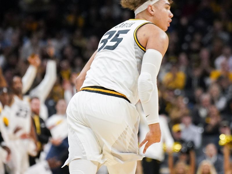 Jan 6, 2024; Columbia, Missouri, USA; Missouri Tigers forward Noah Carter (35) celebrates against the Georgia Bulldogs after making a three point basket during the first half at Mizzou Arena. Mandatory Credit: Denny Medley-USA TODAY Sports