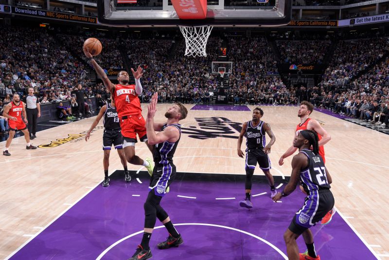 SACRAMENTO, CA - JANUARY 16: Jalen Green #4 of the Houston Rockets drives to the basket during the game against the Sacramento Kings on January 16, 2025 at Golden 1 Center in Sacramento, California. NOTE TO USER: User expressly acknowledges and agrees that, by downloading and or using this Photograph, user is consenting to the terms and conditions of the Getty Images License Agreement. Mandatory Copyright Notice: Copyright 2025 NBAE (Photo by Rocky Widner/NBAE via Getty Images)