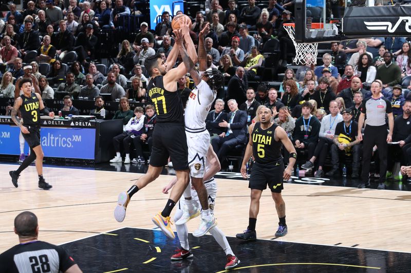 SALT LAKE CITY, UT - APRIL 9: Omer Yurtseven #77 of the Utah Jazz drives to the basket during the game against the Denver Nuggets on April 9, 2024 at Delta Center in Salt Lake City, Utah. NOTE TO USER: User expressly acknowledges and agrees that, by downloading and or using this Photograph, User is consenting to the terms and conditions of the Getty Images License Agreement. Mandatory Copyright Notice: Copyright 2024 NBAE (Photo by Melissa Majchrzak/NBAE via Getty Images)