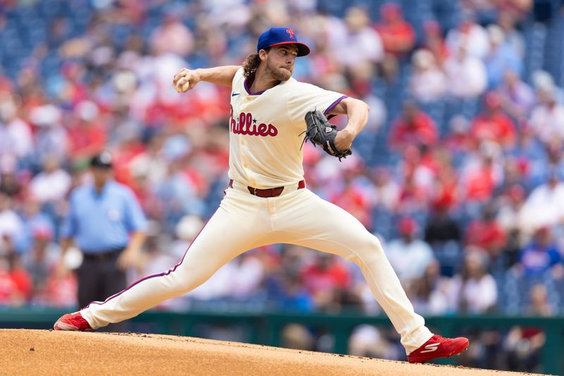 May 8, 2024; Philadelphia, Pennsylvania, USA; Philadelphia Phillies pitcher Aaron Nola (27) throws a pitch during the first inning against the Toronto Blue Jays at Citizens Bank Park. Mandatory Credit: Bill Streicher-USA TODAY Sports