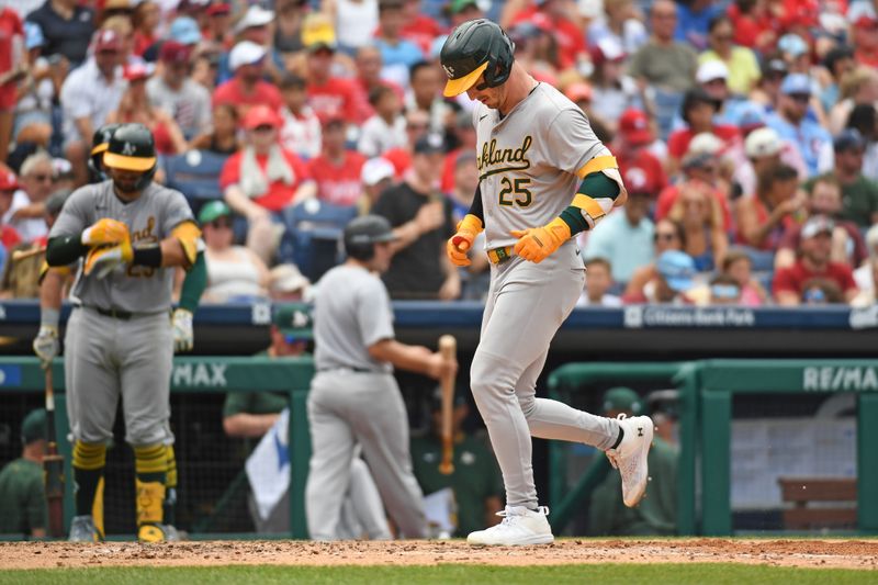 Jul 14, 2024; Philadelphia, Pennsylvania, USA; Oakland Athletics outfielder Brent Rooker (25) steps on home after hitting a two-run home run against the Philadelphia Phillies during the fourth inning at Citizens Bank Park. Mandatory Credit: Eric Hartline-USA TODAY Sports
