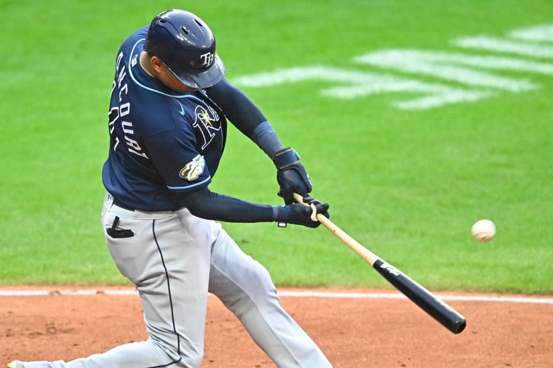 Sep 2, 2023; Cleveland, Ohio, USA; Tampa Bay Rays catcher Christian Bethancourt (14) hits a three run home run in the fifth inning against the Cleveland Guardians at Progressive Field. Mandatory Credit: David Richard-USA TODAY Sports