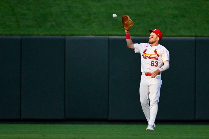 May 3, 2024; St. Louis, Missouri, USA;  St. Louis Cardinals center fielder Michael Siani (63) warms up before a game against the Chicago White Sox at Busch Stadium. Mandatory Credit: Jeff Curry-USA TODAY Sports