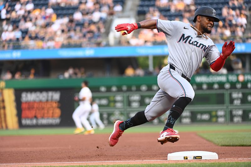 Jun 10, 2025; Pittsburgh, Pennsylvania, USA;  The Miami Marlins Otto Lopez rounds third base towards home plate against the Pittsburgh Pirates during the fourth inning PNC Park. Mandatory Credit: Philip G. Pavely-Imagn Images