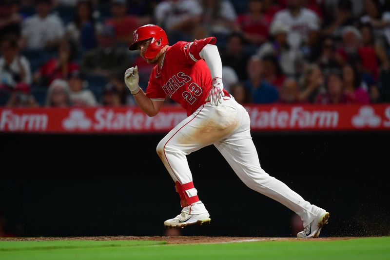 August 16, 2024; Anaheim, California, USA; Los Angeles Angels second base Brandon Drury (23) runs after hitting into a fielders choice against the Atlanta Braves during the sixth inning at Angel Stadium. Mandatory Credit: Gary A. Vasquez-USA TODAY Sports