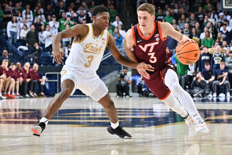 Feb 10, 2024; South Bend, Indiana, USA; Virginia Tech Hokies guard Sean Pedulla (3) dribbles as Notre Dame Fighting Irish guard Markus Burton (3) defends in the first half at the Purcell Pavilion. Mandatory Credit: Matt Cashore-USA TODAY Sports