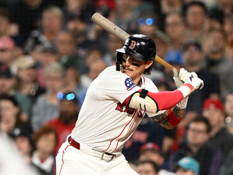May 17, 2025; Boston, Massachusetts, USA; Boston Red Sox left fielder Jarren Duran (16) hits a two-run RBI against the Atlanta Braves during the eighth inning at Fenway Park. Mandatory Credit: Brian Fluharty-Imagn Images