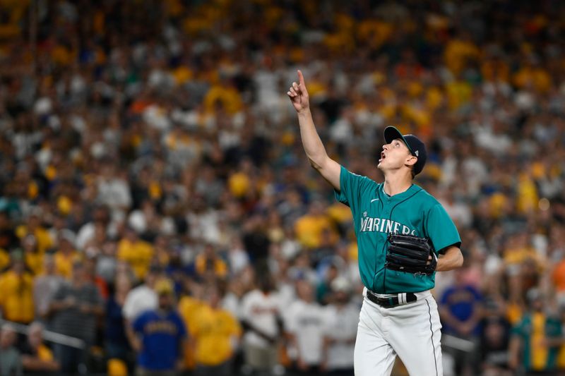 Aug 12, 2023; Seattle, Washington, USA; Seattle Mariners starting pitcher George Kirby (68) calls for a fly ball before making the catch for the final out of the inning against the Baltimore Orioles during the ninth inning at T-Mobile Park. Mandatory Credit: Steven Bisig-USA TODAY Sports