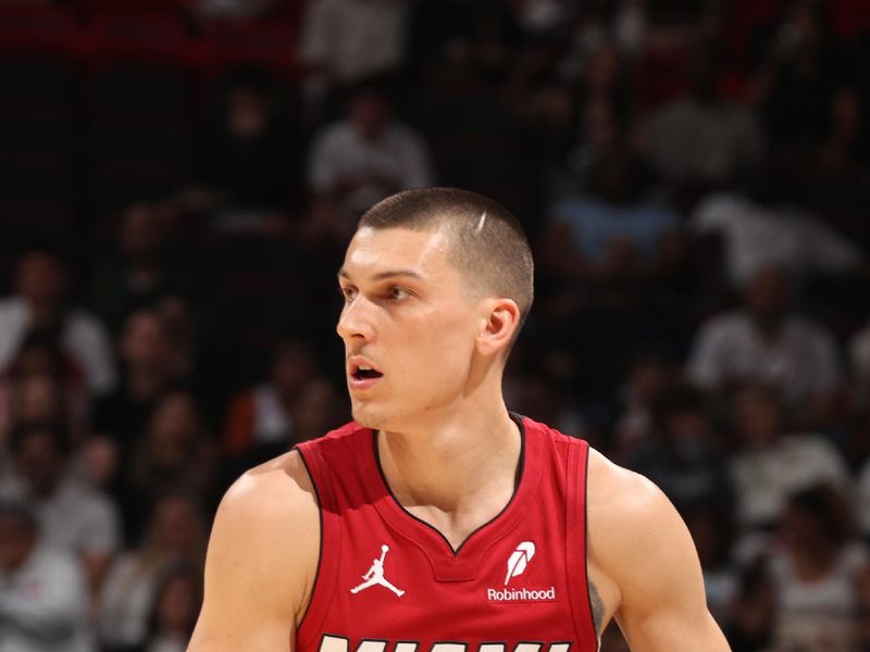 MIAMI, FL - MARCH 3:  Tyler Herro #14 of the Miami Heat handles the ball during the game against the Washington Wizards on March 3, 2025 at Kaseya Center in Miami, Florida. NOTE TO USER: User expressly acknowledges and agrees that, by downloading and or using this Photograph, user is consenting to the terms and conditions of the Getty Images License Agreement. Mandatory Copyright Notice: Copyright 2025 NBAE (Photo by Issac Baldizon/NBAE via Getty Images)