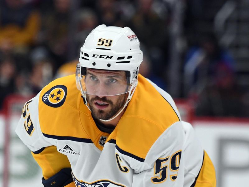 Nov 11, 2024; Denver, Colorado, USA; Nashville Predators defenseman Roman Josi (59) waits for a face off during the first period against the Colorado Avalanche at Ball Arena. Mandatory Credit: Christopher Hanewinckel-Imagn Images