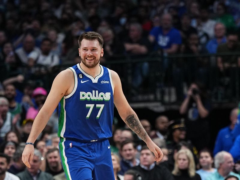 DALLAS, TX - DECEMBER 5: Luka Doncic #77 of the Dallas Mavericks smiles during the game against the Phoenix Suns on December 5, 2022 at the American Airlines Center in Dallas, Texas. NOTE TO USER: User expressly acknowledges and agrees that, by downloading and or using this photograph, User is consenting to the terms and conditions of the Getty Images License Agreement. Mandatory Copyright Notice: Copyright 2022 NBAE (Photo by Glenn James/NBAE via Getty Images)