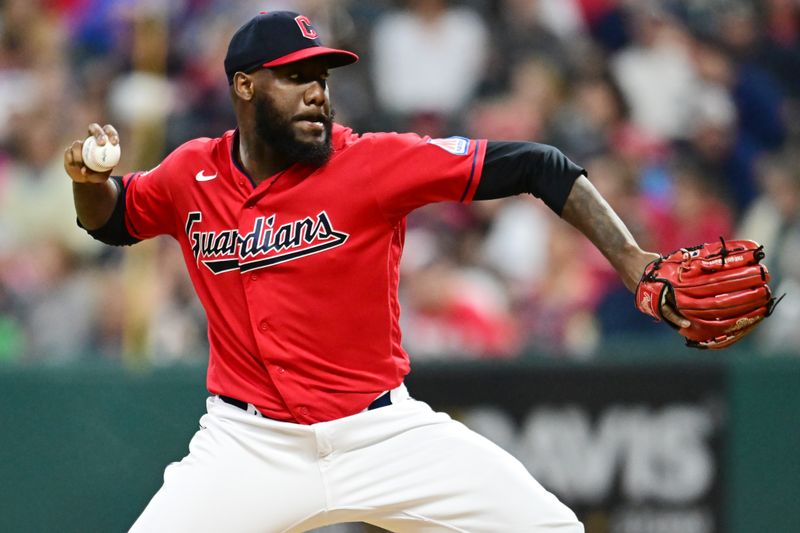 Sep 16, 2023; Cleveland, Ohio, USA; Cleveland Guardians relief pitcher Enyel De Los Santos (62) throws a pitch during the sixth inning against the Texas Rangers at Progressive Field. Mandatory Credit: Ken Blaze-USA TODAY Sports