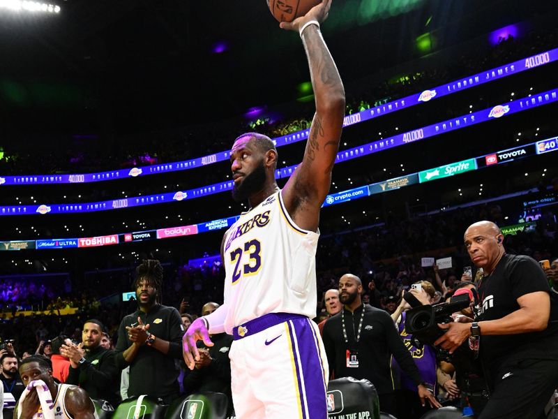 LOS ANGELES, CA - MARCH 2: LeBron James #23 of the Los Angeles Lakers celebrates after scoring his 40,000th point during the game against the Denver Nuggets on March 2, 2024 at Crypto.Com Arena in Los Angeles, California. NOTE TO USER: User expressly acknowledges and agrees that, by downloading and/or using this Photograph, user is consenting to the terms and conditions of the Getty Images License Agreement. Mandatory Copyright Notice: Copyright 2024 NBAE (Photo by Adam Pantozzi/NBAE via Getty Images)