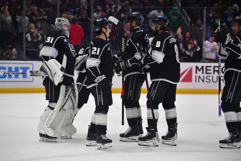 Mar 11, 2024; Los Angeles, California, USA; Los Angeles Kings celebrate the victory against the New York Islanders  at Crypto.com Arena. Mandatory Credit: Gary A. Vasquez-USA TODAY Sports