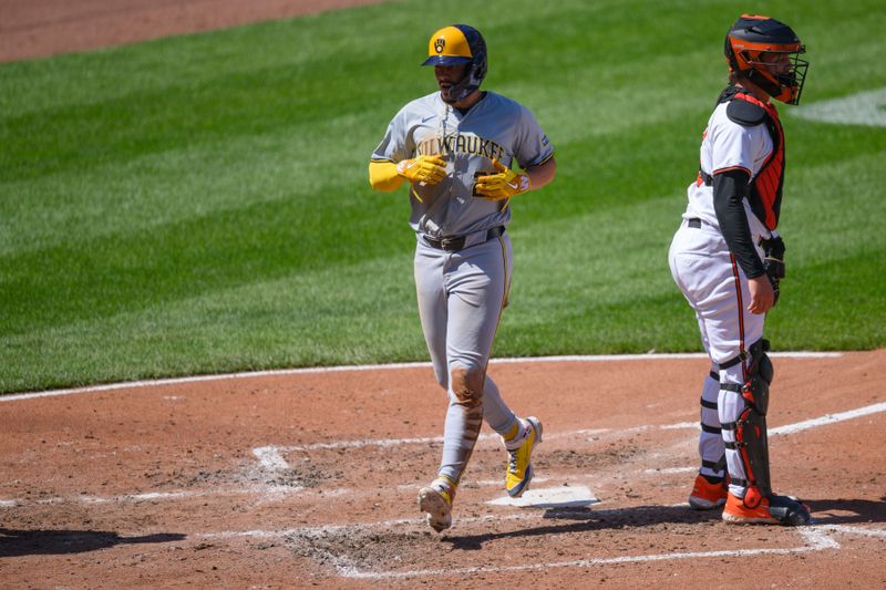 Apr 14, 2024; Baltimore, Maryland, USA; Milwaukee Brewers shortstop Willy Adames (27) scores a run during the fourth inning against the Baltimore Orioles at Oriole Park at Camden Yards. Mandatory Credit: Reggie Hildred-USA TODAY Sports