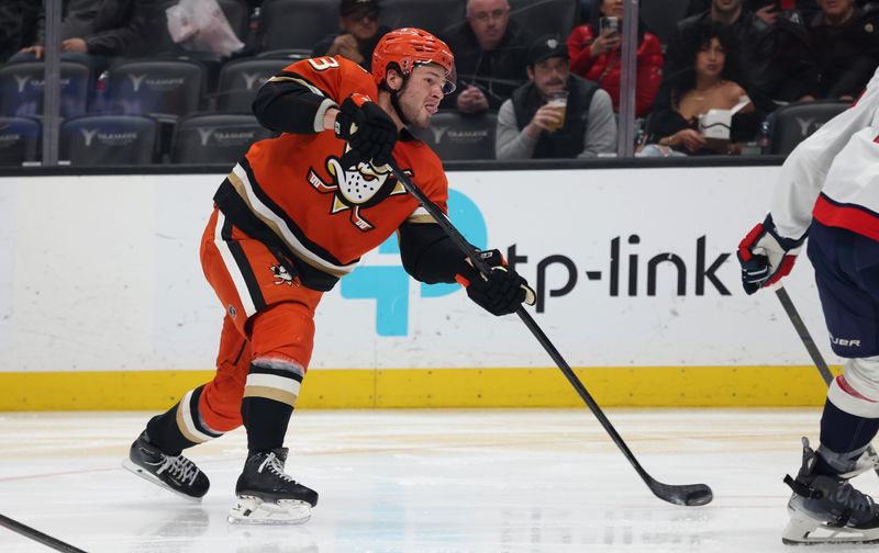 Mar 11, 2025; Anaheim, California, USA; Anaheim Ducks center Mason McTavish (23) shoots during the second period against the Washington Capitals at Honda Center. Mandatory Credit: Jason Parkhurst-Imagn Images