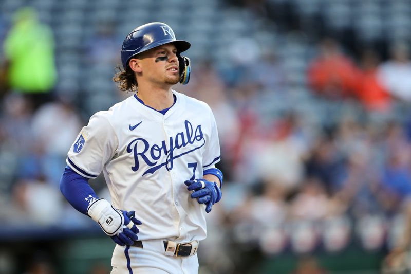 Jun 24, 2024; Kansas City, Missouri, USA; Kansas City Royals shortstop Bobby Witt Jr. (7) walks to first base during the first inning against the Miami Marlins at Kauffman Stadium. Mandatory Credit: William Purnell-USA TODAY Sports