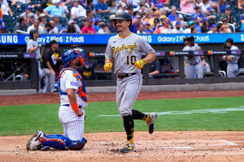 Aug 16, 2023; New York City, New York, USA;  Pittsburgh Pirates designated hitter Bryan Reynolds (10) crosses home plate after hitting a two run home run against the New York Mets during the third inning at Citi Field. Mandatory Credit: Gregory Fisher-USA TODAY Sports