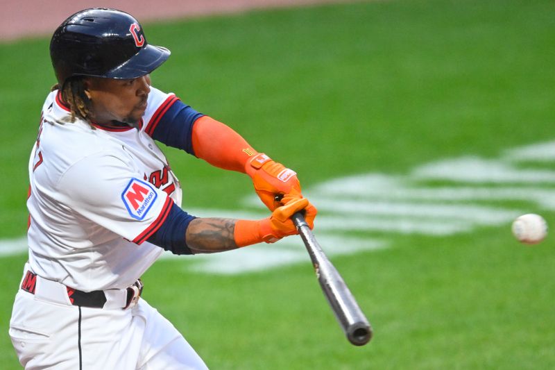 Sep 9, 2025; Cleveland, Ohio, USA; Cleveland Guardians third baseman Jose Ramirez (11) doubles in the fourth inning against the Kansas City Royals at Progressive Field. Mandatory Credit: David Richard-Imagn Images