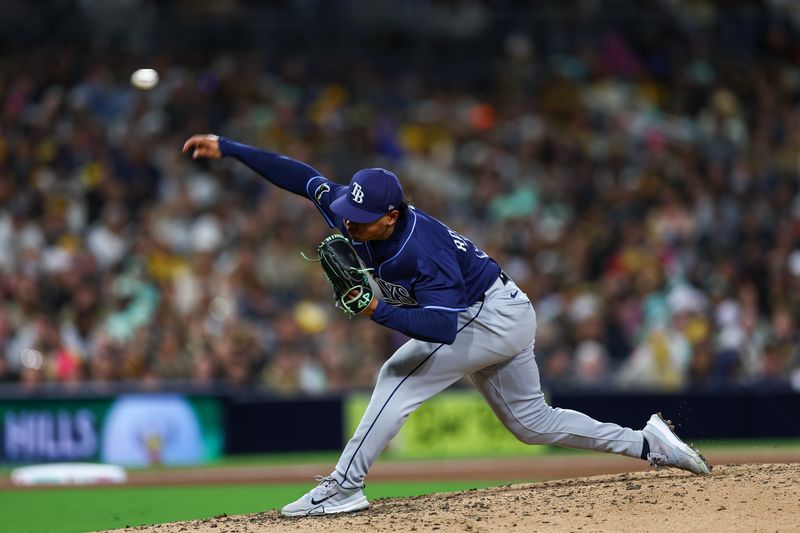 Apr 25, 2025; San Diego, California, USA; Tampa Bay Rays relief pitcher Manuel Rodriguez (39) pitches during the eighth inning against the San Diego Padres at Petco Park. Mandatory Credit: Chadd Cady-Imagn Images