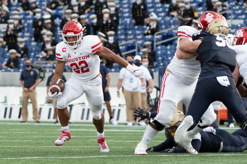 Oct 24, 2020; Annapolis, Maryland, USA;  Houston Cougars running back Kyle Porter (22) rushes during the first half against the Navy Midshipmen at Navy-Marine Corps Memorial Stadium. Mandatory Credit: Tommy Gilligan-USA TODAY Sports