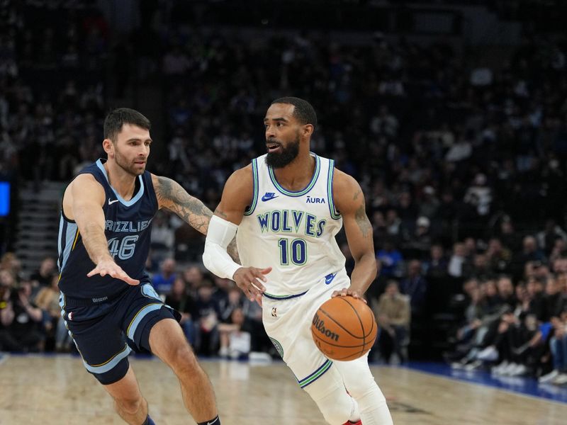 MINNEAPOLIS, MN -  JANUARY 18: Mike Conley #10 of the Minnesota Timberwolves drives to the basket during the game against the Memphis Grizzlies on January 18, 2024 at Target Center in Minneapolis, Minnesota. NOTE TO USER: User expressly acknowledges and agrees that, by downloading and or using this Photograph, user is consenting to the terms and conditions of the Getty Images License Agreement. Mandatory Copyright Notice: Copyright 2024 NBAE (Photo by Jordan Johnson/NBAE via Getty Images)