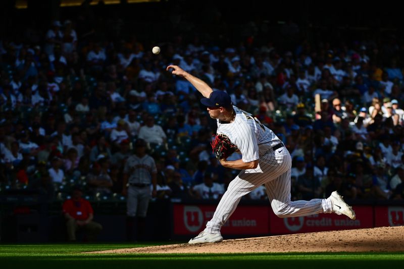 May 27, 2023; Milwaukee, Wisconsin, USA; Milwaukee Brewers pitcher Trevor Megill (29) pitches against the San Francisco Giants in the ninth inning at American Family Field. Mandatory Credit: Benny Sieu-USA TODAY Sports