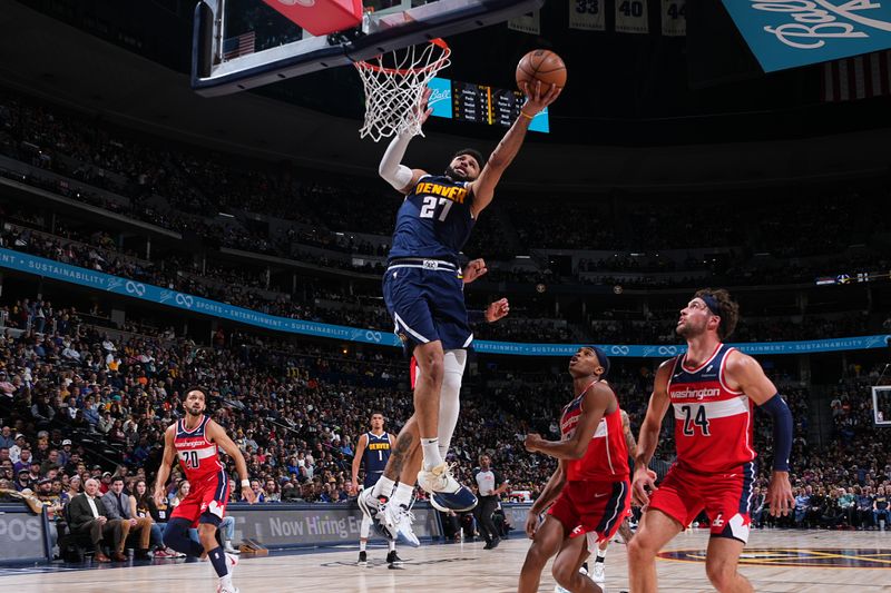 DENVER, CO - FEBRUARY 22: Jamal Murray #27 of the Denver Nuggets drives to the basket during the game against the Washington Wizards on February 22, 2024 at the Ball Arena in Denver, Colorado. NOTE TO USER: User expressly acknowledges and agrees that, by downloading and/or using this Photograph, user is consenting to the terms and conditions of the Getty Images License Agreement. Mandatory Copyright Notice: Copyright 2024 NBAE (Photo by Garrett Ellwood/NBAE via Getty Images)